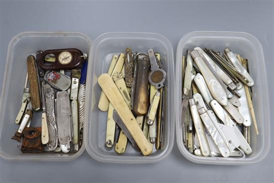 A collection of mother of pearl and silver folding fruit knives, and other sundry pocket knives